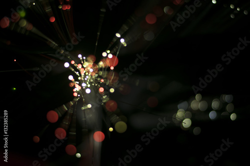 Nong Prajak Public Park Udon Thani, Thailand bokeh LED flowers colorful illuminated plastic optical fibers in dark back photo