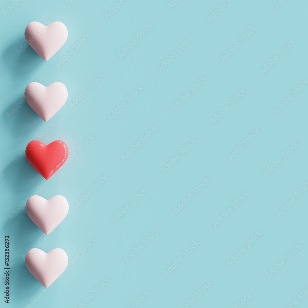 Vertical tiny hearts shapes made by red and pink heart on ble background for copy space. minimal concept.