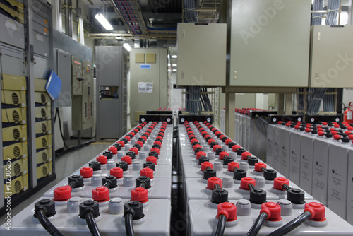 Room with many cables and many batteries.