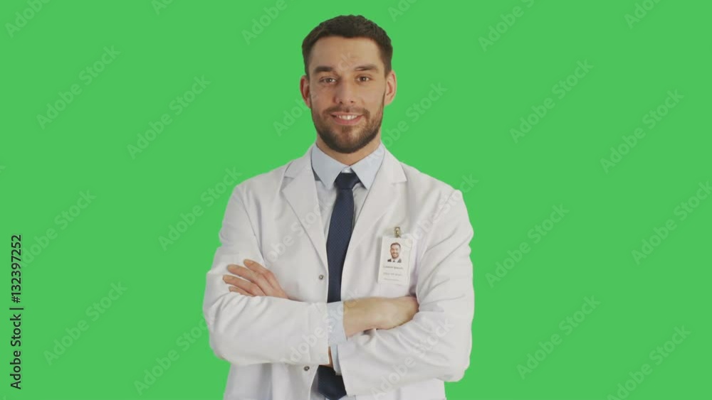 Mid Shot of a Handsome Doctor/ Scientist Crossing Arms on a Chest. Shot Taking Place with Green Screen Background. Shot on RED Cinema Camera 4K (UHD). Mid Shot of a Handsome Doctor/ Scientist Crossing Arms on a Chest. Shot Taking Place with Green Screen Background. Shot on RED Cinema Camera 4K (UHD).