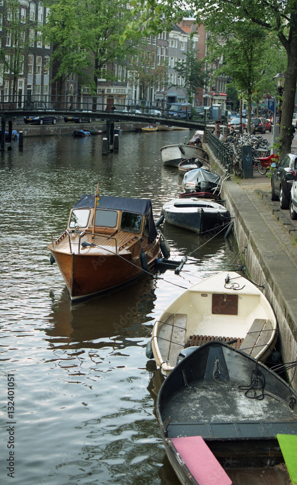 Netherlands, Amsterdam. Types of cities, buildings, canals and boats. Views on the water .