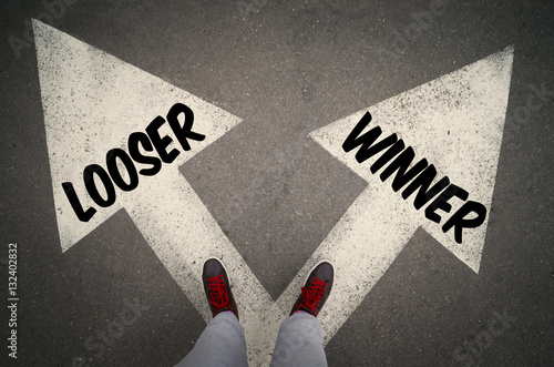 WINNER versus LOOSER written on the white arrows