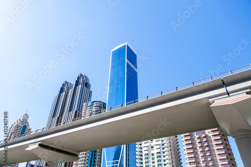 Cityscape of modern buildings and railway in city center. Modern