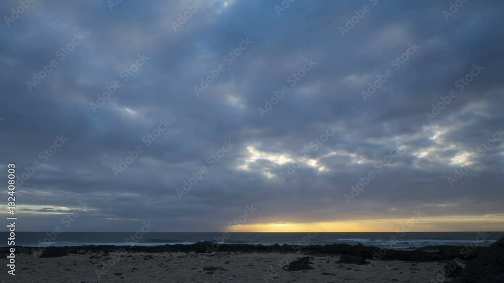 Day to night timelapse of clouds rolling over sea. Idyllic view of dramatic sky changing color due to sunset. Scenic view of beach. 4K resolution.
Day to night timelapse of clouds rolling over sea. Idyllic view of dramatic sky changing color due to sunset. Scenic view of beach. 4K resolution.