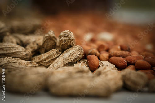 Close Up Peanuts on the wood background