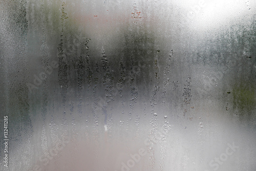 Water drop on glass windows background