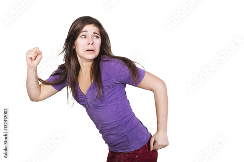 Brunette woman run scared isolated on white