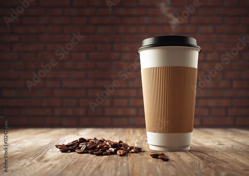 Paper cup of coffee with coffee beans on old wooden table