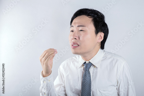 Asian man is talking