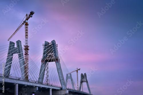 Cranes in construction of the cable-stayed bridge. Cracow Poland