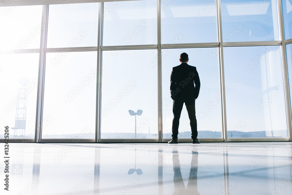 Businessman thinking about new goals and concept Businessman thinking about new goals and concept