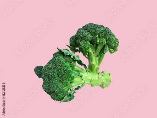 Fresh Broccoli isolated on pink background. (with clipping path)
