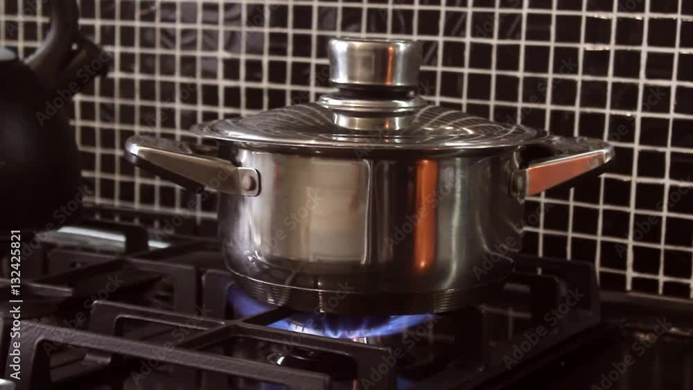 Preparing lunch for the family. Cooking in a kitchen. Preparing lunch for the family. Cooking in a kitchen.