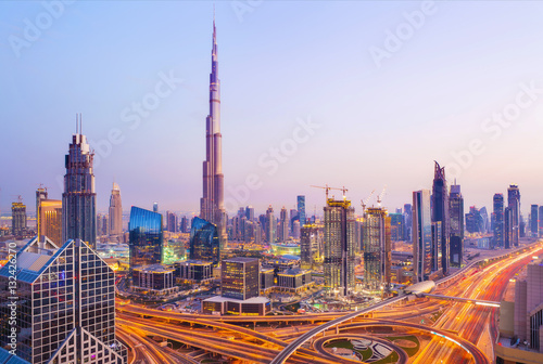 Canvas Print View on modern skyscrapers and busy evening highways in luxury D