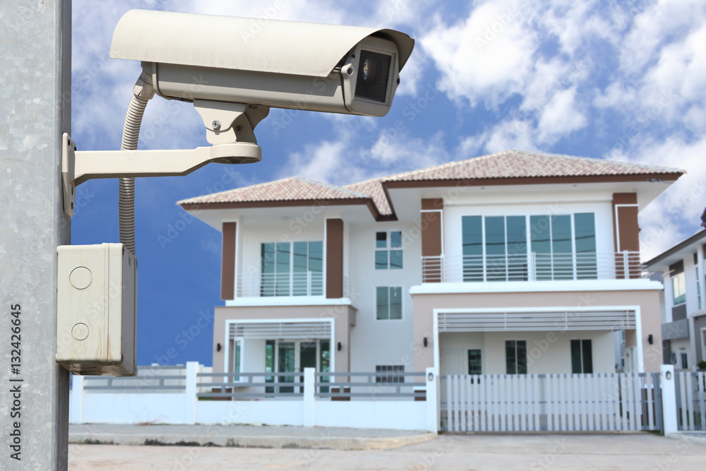 CCTV Camera with house background.