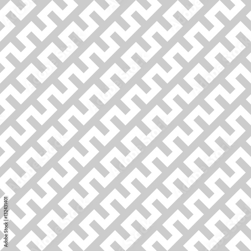 White zigzag lines in diagonal arrangement on grey background. Abstract background geometrical seamless pattern