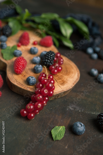 Fresh berries on wooden background