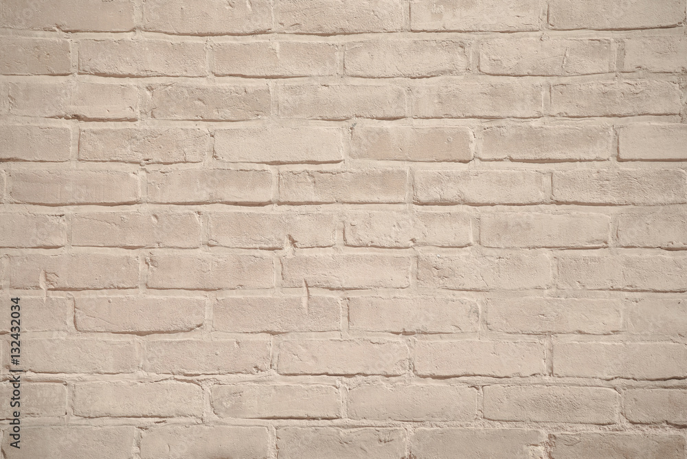 Fototapeta premium Beige grunge brick wall texture background