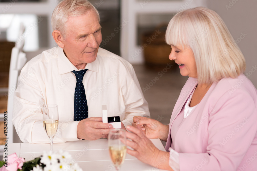 Handsome elderly man making a proposal Handsome elderly man making a proposal