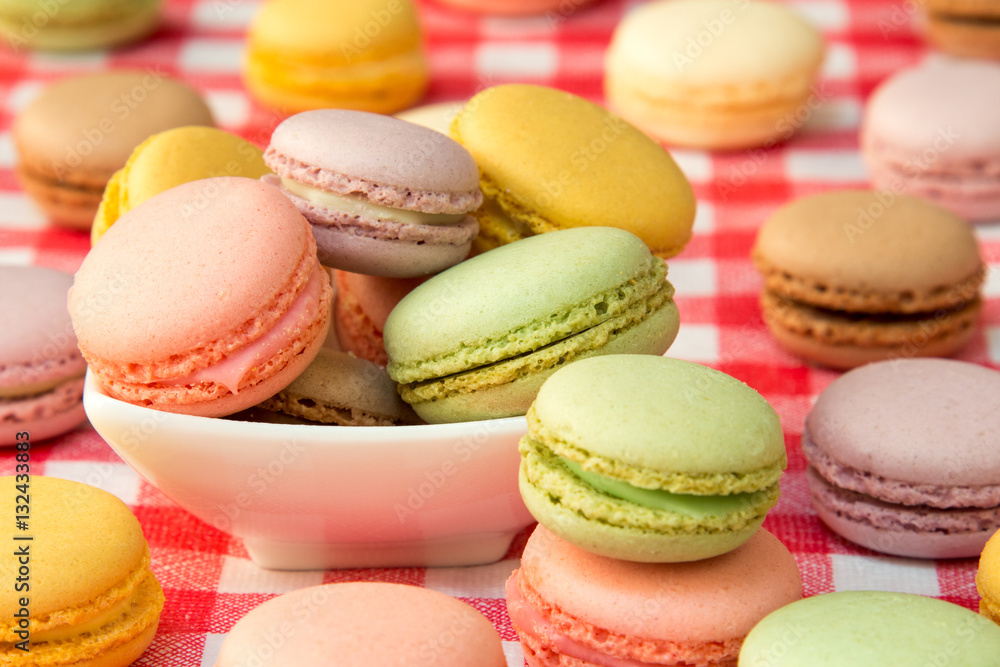 French colorful macarons in a bowl French colorful macarons in a bowl