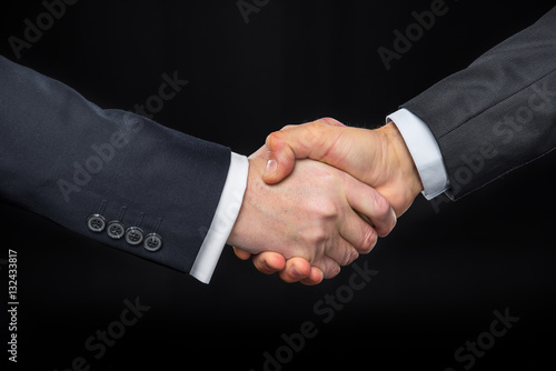 Businespeople shaking hands