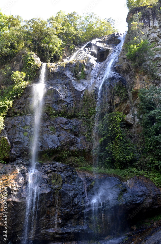 Obraz premium Waterfall in deep forest on the mountain.