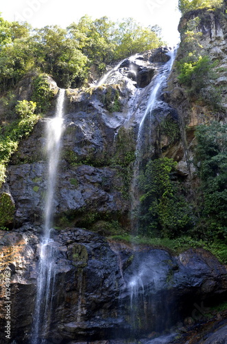 Waterfall in deep forest on the mountain.