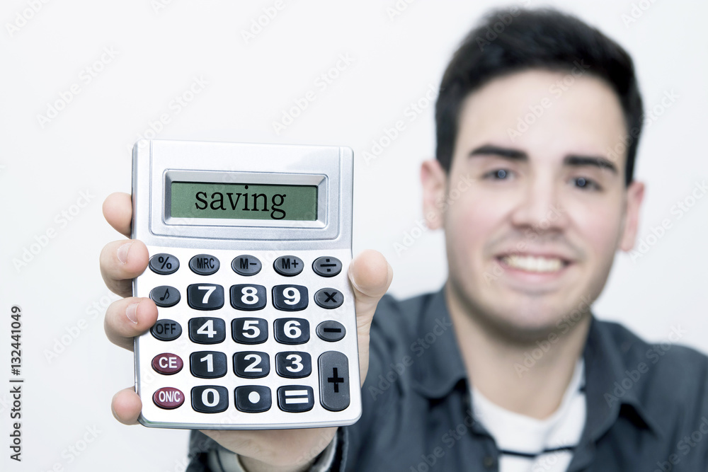 calculator in first plane with man to the background smiling calculator in first plane with man to the background smiling