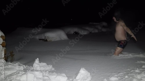 Steamed After a Sauna Man Dives Into the Cold Snow