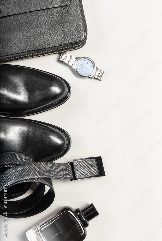 shoes and accessories for men lay on the wooden floor shoes and accessories for men lay on the wooden floor