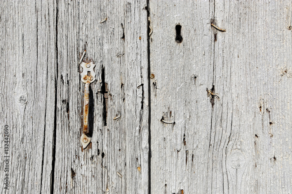 Very old wooden door with handle Very old wooden door with handle