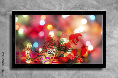 christmas decoration with hdtv on concrete wall background