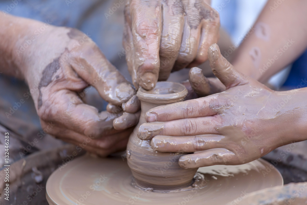 Pottery making, close up on hands