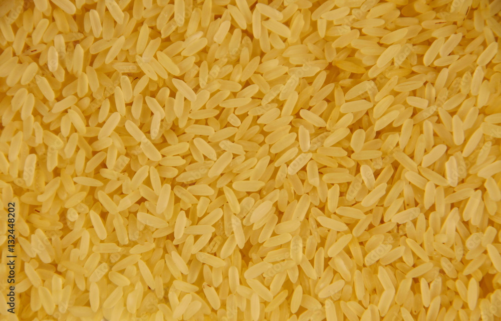Background of a raw long grain rice Background of a raw long grain rice
