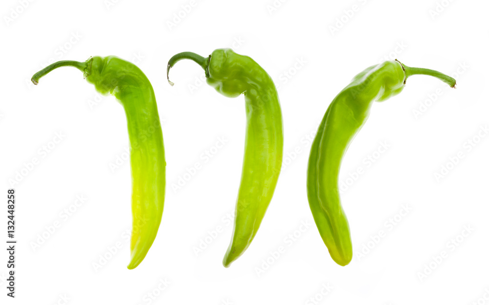 Three green peppers on white background Three green peppers on white background