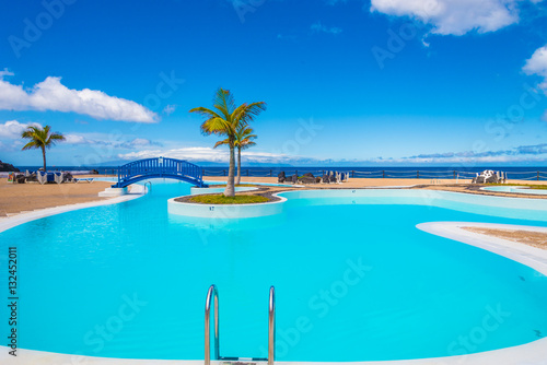 Fototapeta Naklejka Na Ścianę i Meble -  Swimming pools at blue sky