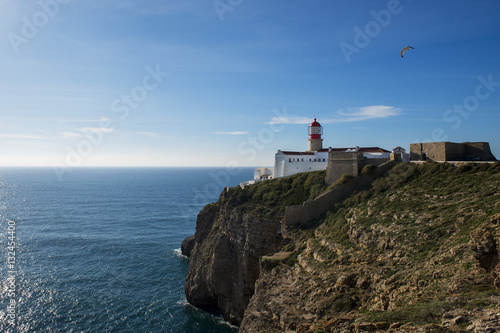 View of the Lighthouse at the Saint Vincent Cape (Cabo de Sao Vincente) in Sagres, Algarve, Portugal; Concept for travel in Portugal