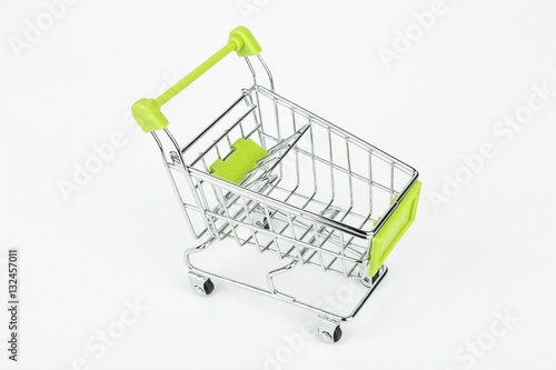 Metal shopping trolley. Empty cart. Macro shot.