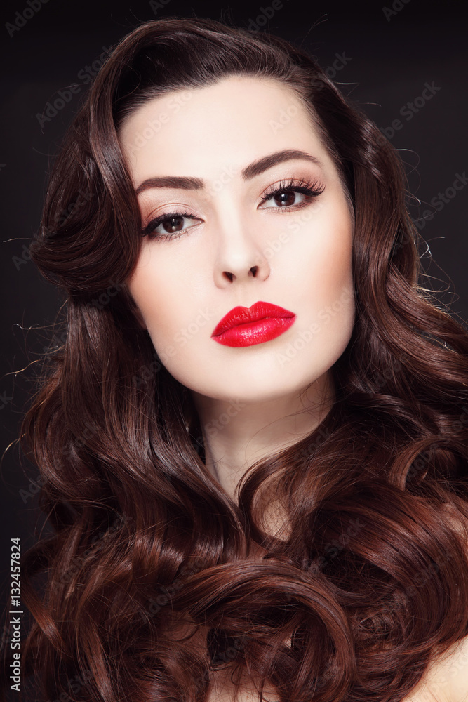 Portrait of young beautiful woman with long curly hair and red lipstick Portrait of young beautiful woman with long curly hair and red lipstick