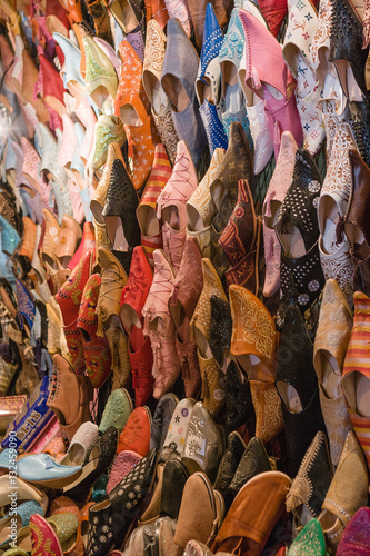 Souk with shoes and sandals at Marrakech, Morocco