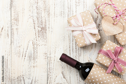 Red wine bottle and gift boxes
