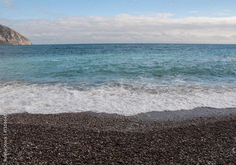 pebble beach on a sunny day in high quality