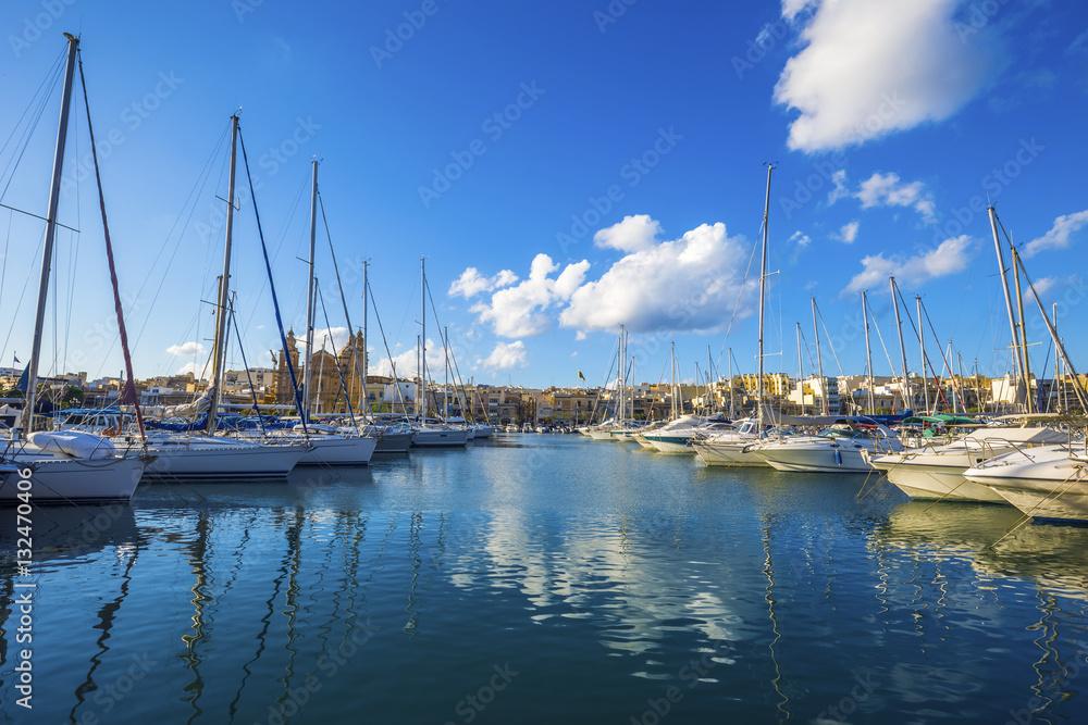 Msida, Malta - Yacht marina with blue sky and nice clouds on a summer day