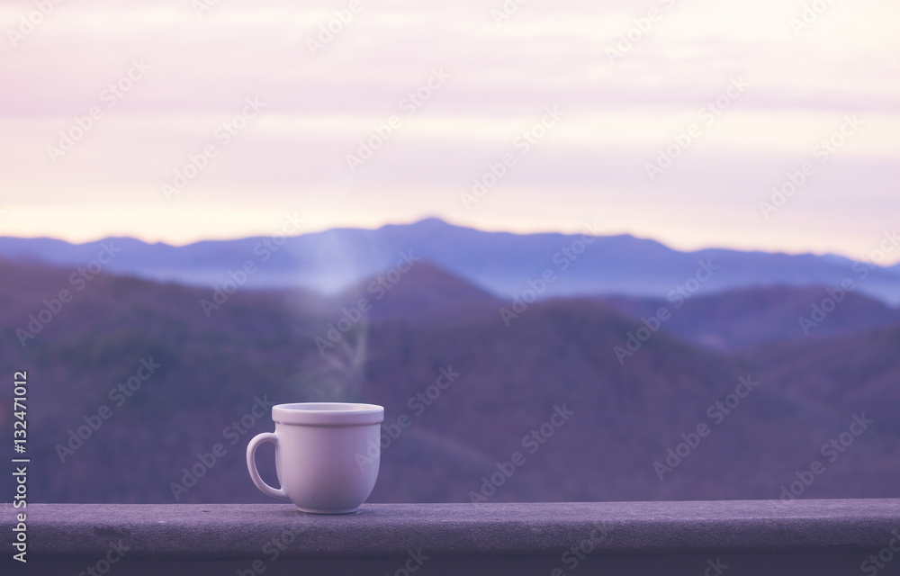 Morning coffe cup with alpine mountain view Morning coffe cup with alpine mountain view