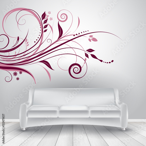Room interior with sofa showing wall decal