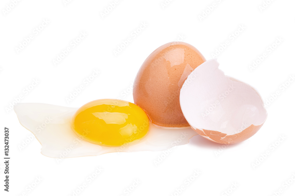 Close up of cracked egg on white background. Close up of cracked egg on white background.