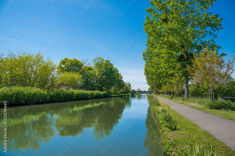 The Burgundy canal in France on a beautiful spring summer day The Burgundy canal in France on a beautiful spring summer day