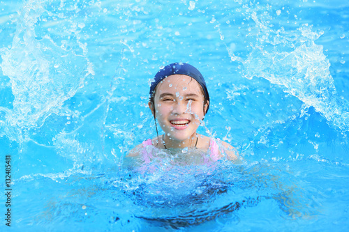 children girl in swimming pool