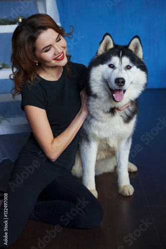 Girl with Husky dogs