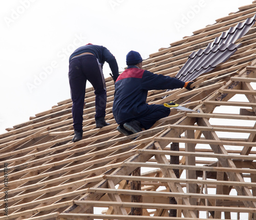 Wallpaper Mural workers working on the roof Torontodigital.ca